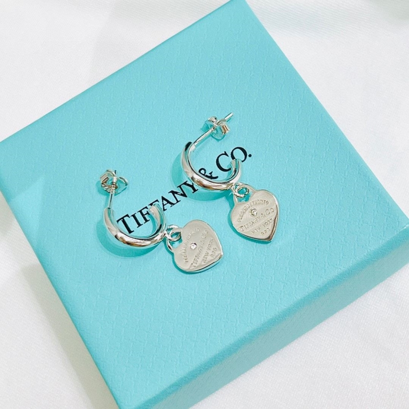 T*f*ny earrings